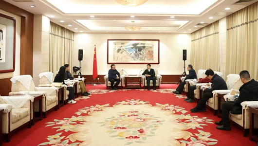 谷振春会见国家发展改革委地区振兴司一行